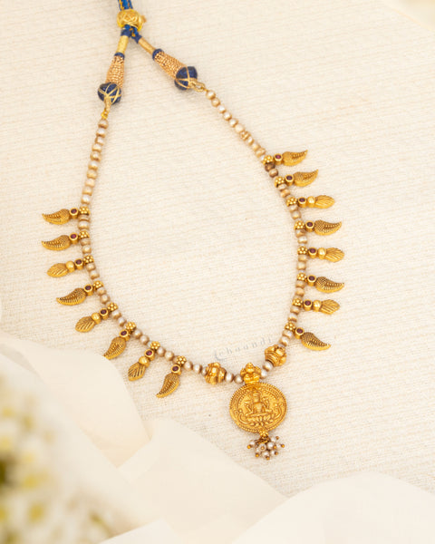 Antique Gold Polish Threaded Necklace With Mango Leaf Motifs And Lakshmi Coin Pendant