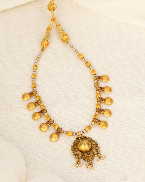 Antique Gold Polish Threaded Necklace With Gold Disc Shaped Motifs And Pearls