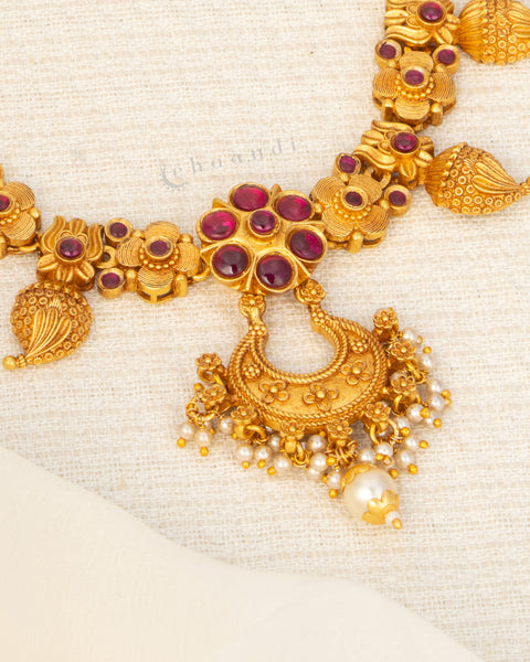 Antique Gold Polish Necklace With Mango And Kemp Ruby Floral Motifs, Chandbali Pendant And Pearl Drops