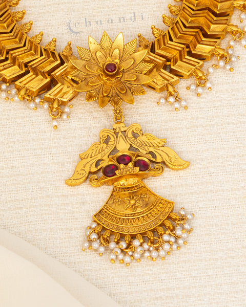 Antique Gold Polish Necklace With Lotus, Ruby Peacock Hanging Long Pendant And Pearl Drops